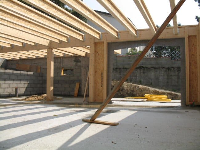 Réalisation en poutres en I TRICA apparentes dans une construction bois